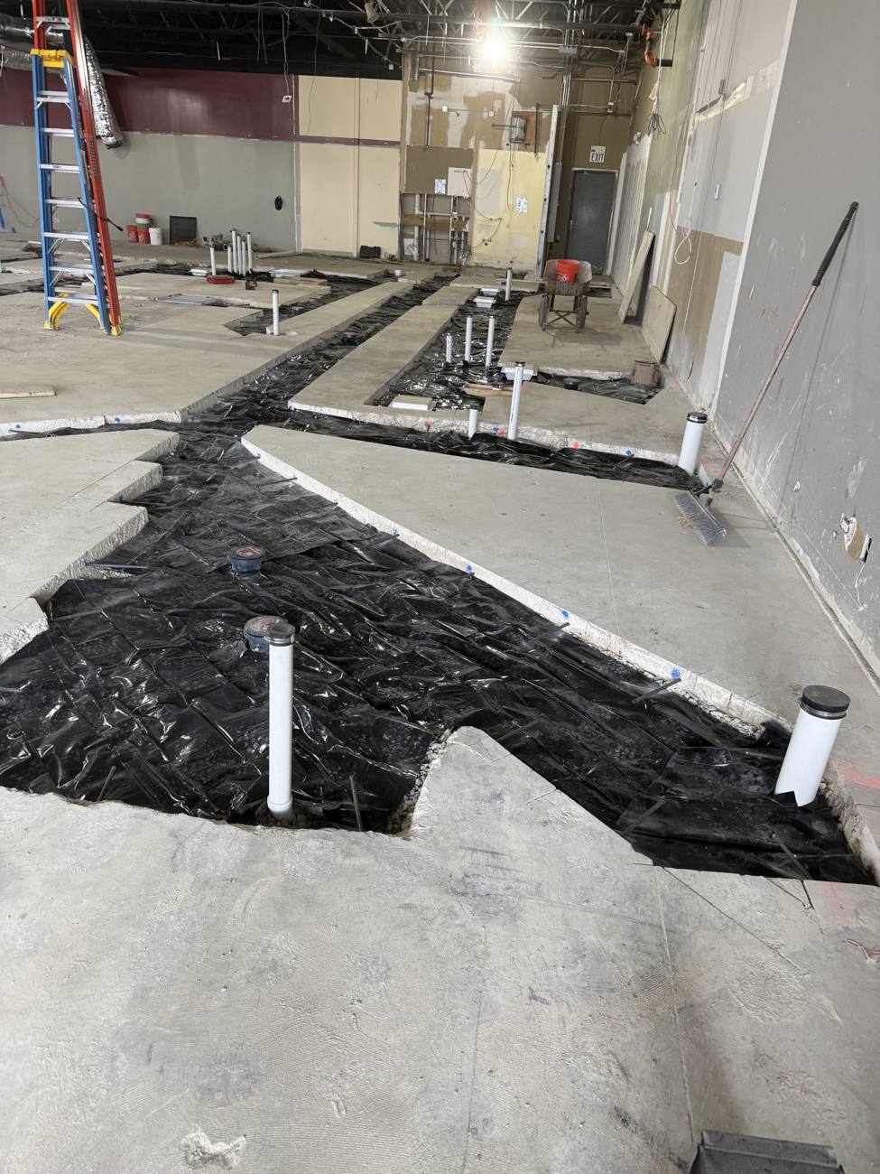 Underground plumbing rough-in on commercial new construction